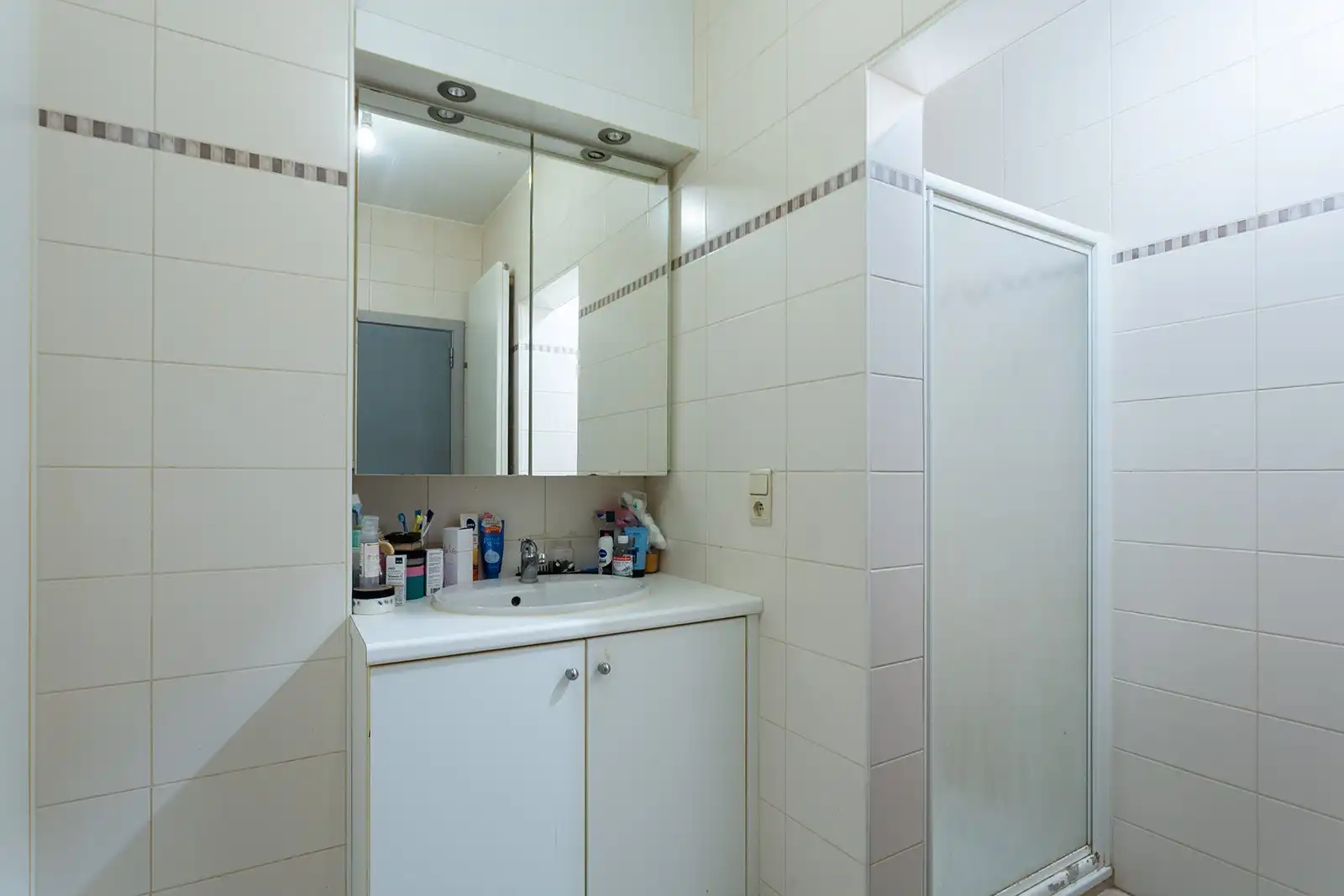 Opbrengsteigendom met 6 appartementen en 9 garageboxen foto 12