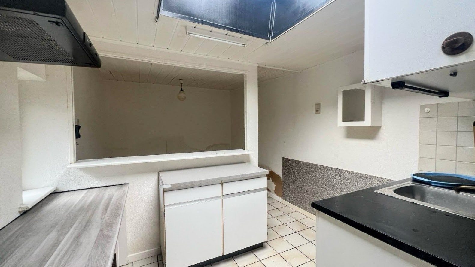 Betaalbare renovatiewoning in het gezellige Uikhoven foto 5