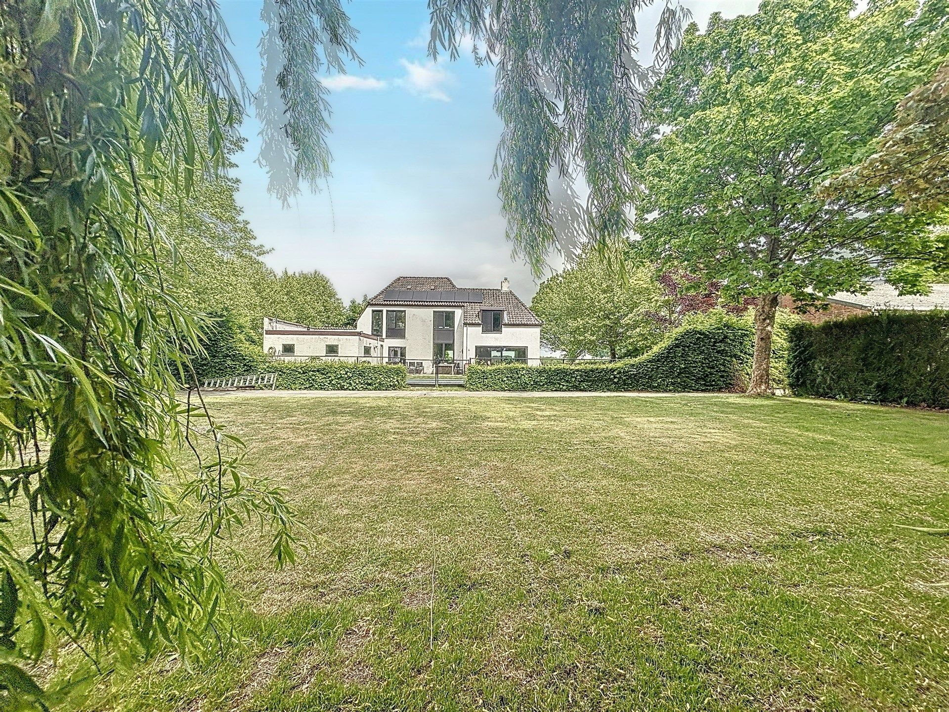 Prachtige villa met 5 slaapkamers, garage en verwarmd zwembad op perceel van 5864 m². foto 10