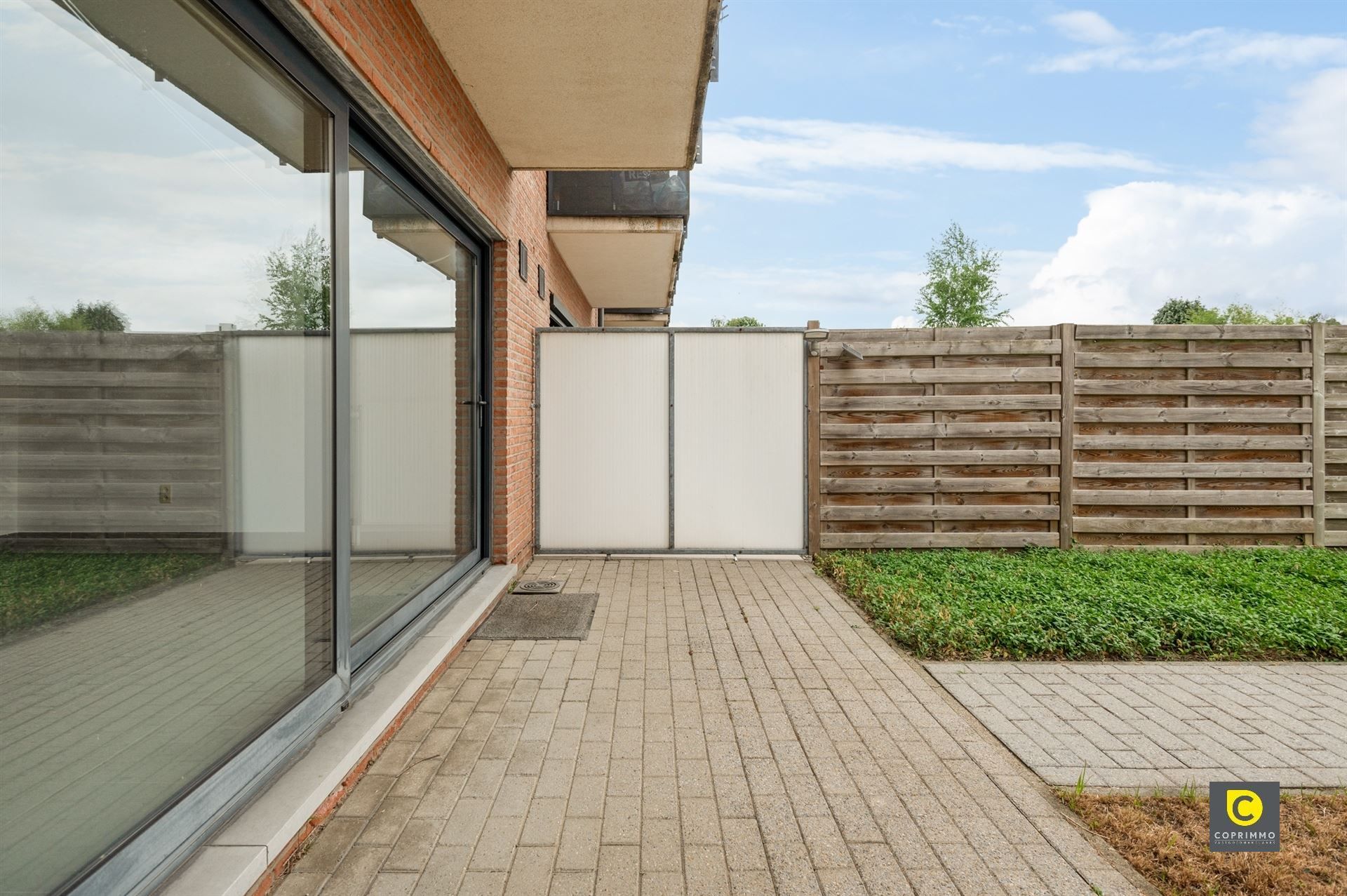 Gelijkvloers app met 2 slpk, tuin en garagebox foto 12