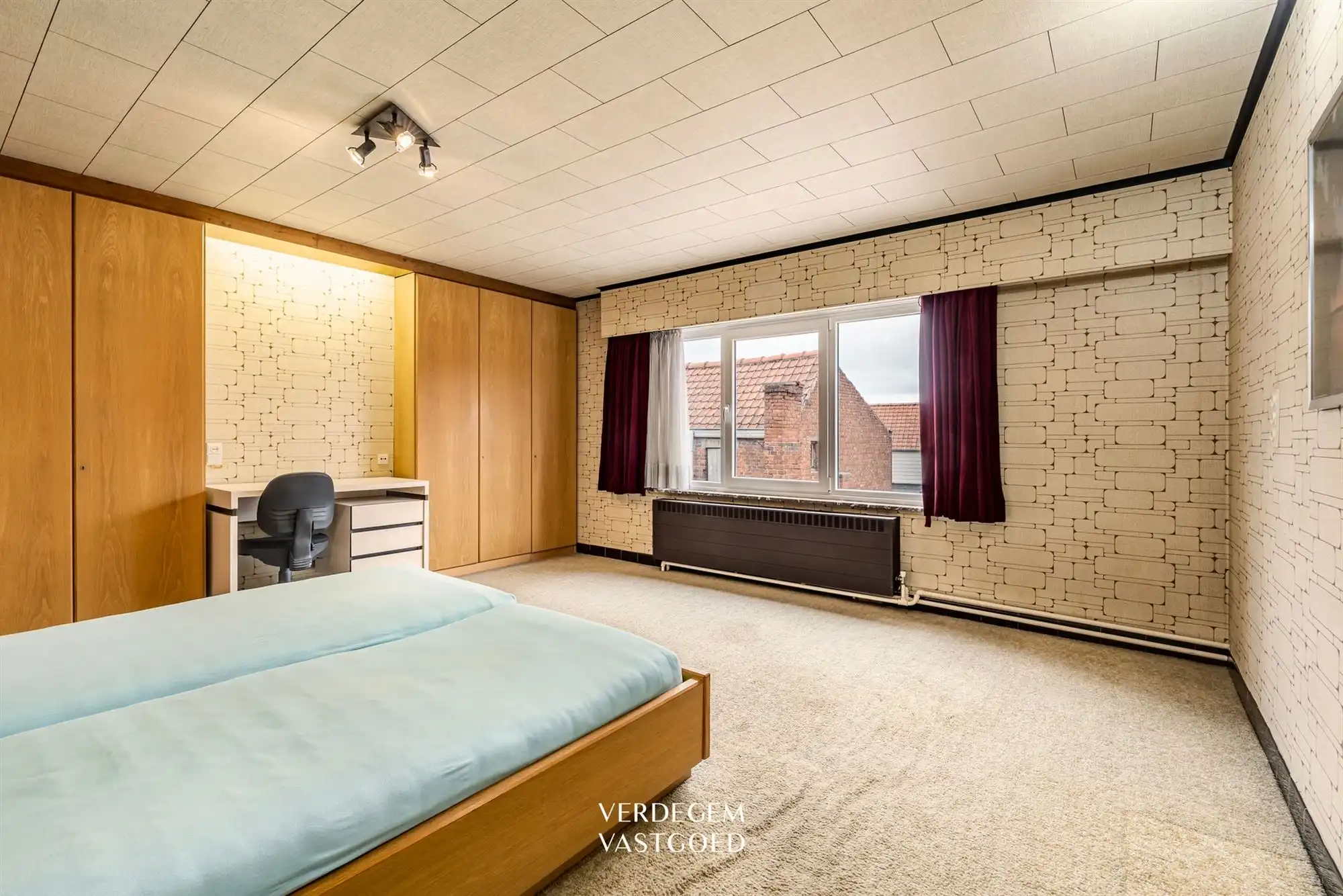 Degelijke gezinswoning met 3+2 slaapkamers, inpandige garage en tuin foto 8
