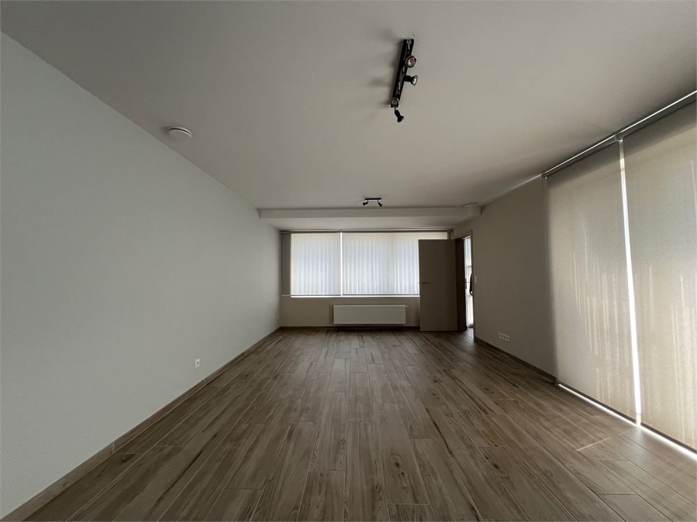 Instapklaar gelijkvloers appartement met 2 slaapkamers en tuin. foto 4