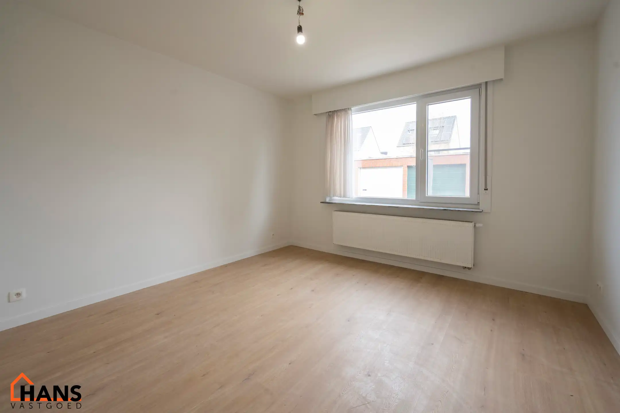 Gerenoveerd gelijkvloersappartement met garagebox. foto 9
