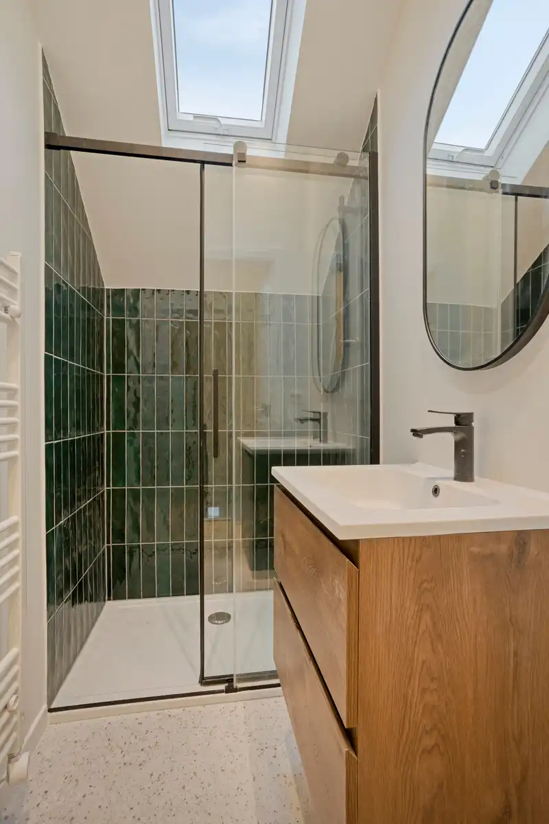 Verscholen achter een charmante groene gevel: prachtig gerenoveerde woning met 3 slaapkamers foto 13