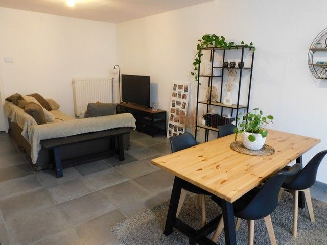 Knus gelijkvloers appartement met tuin  foto 2