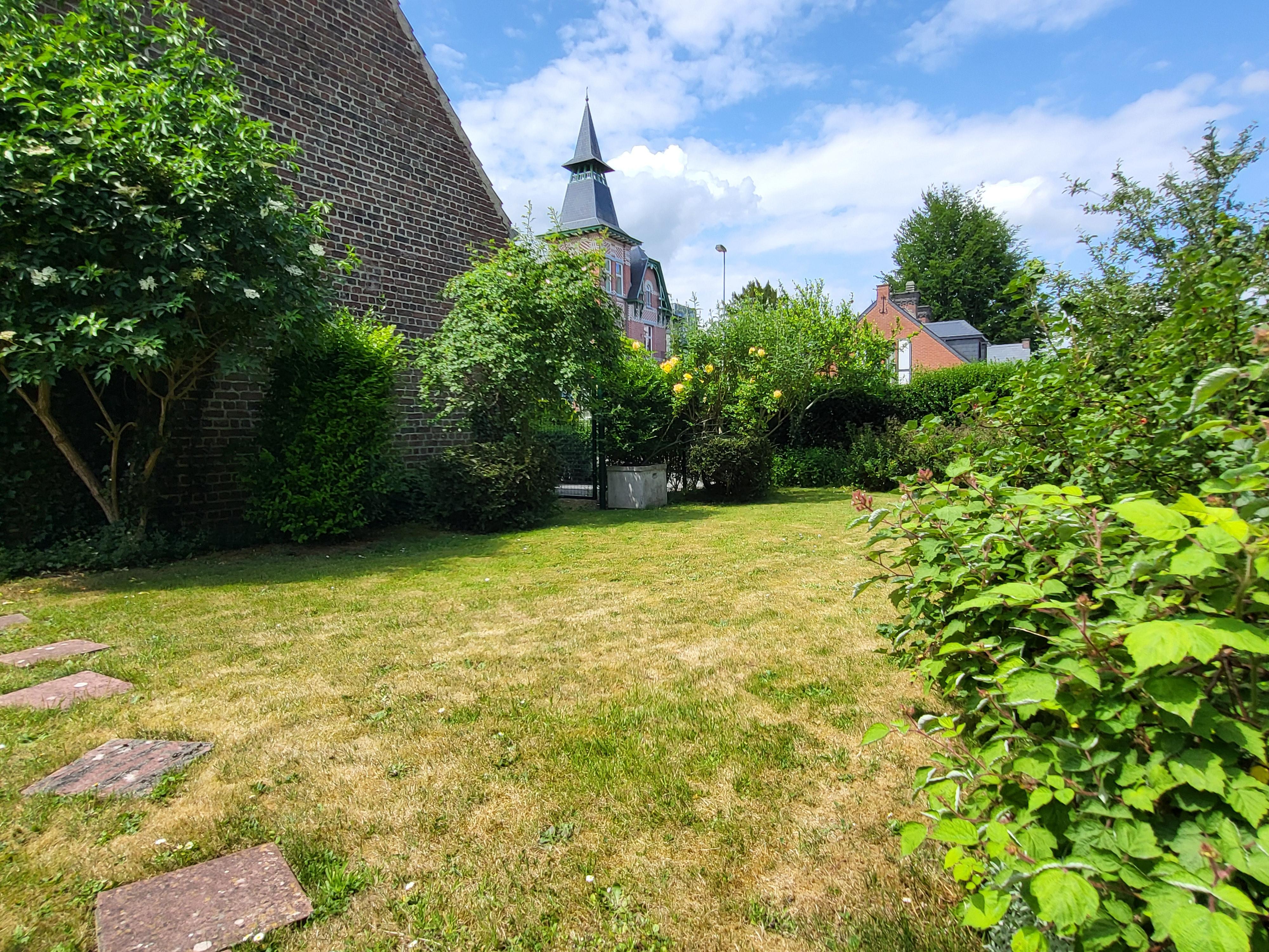 Charmante open bebouwing op 488m² met mooie aangelegde tuin.  foto 7