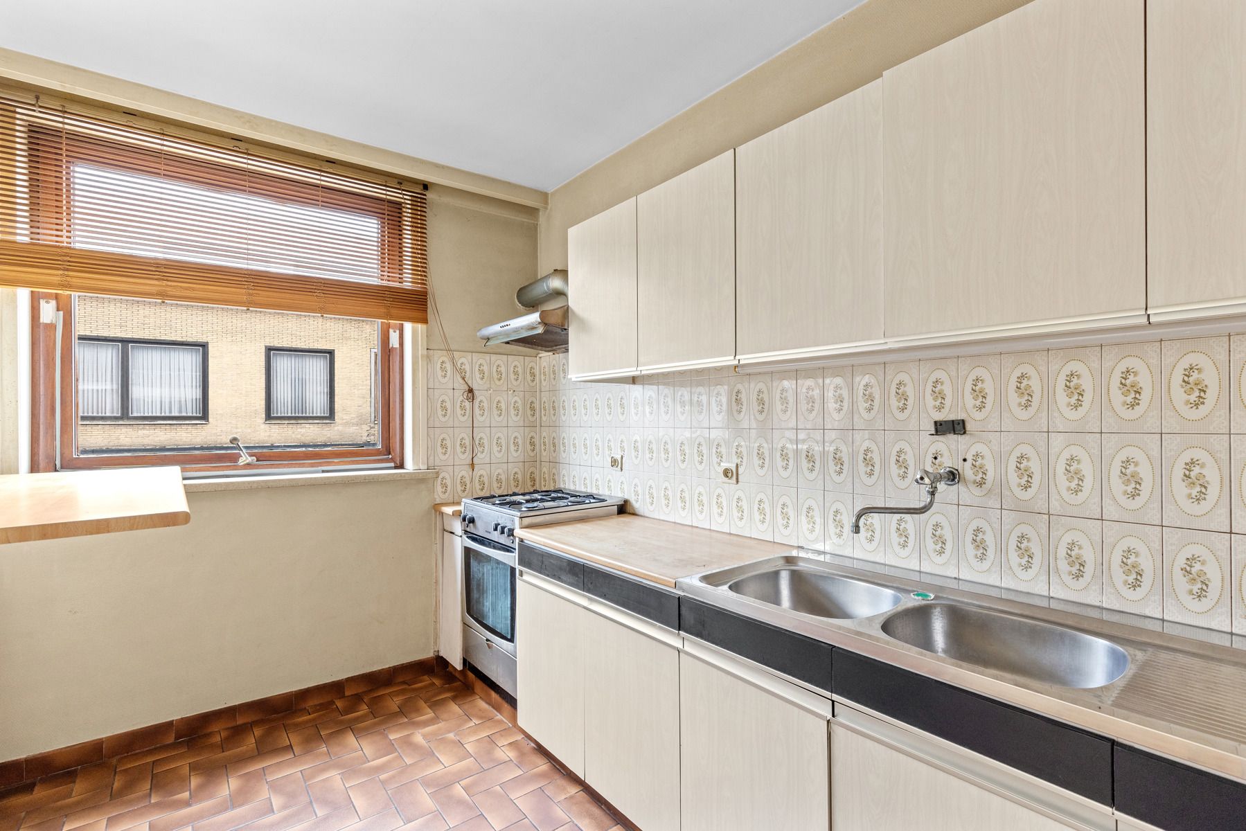 Appartement te koop in Geluwe – Op te frissen woning op toplocatie! foto 9