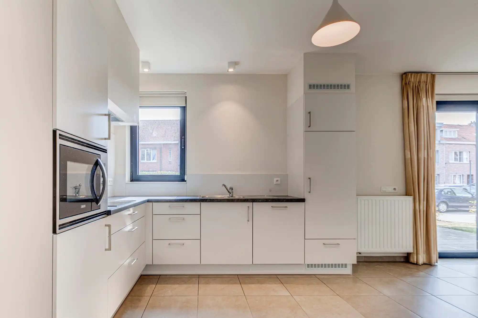 Geniet van zorgeloos comfort in deze gelijkvloerse assistentiewoning met autostaanplaats foto 4