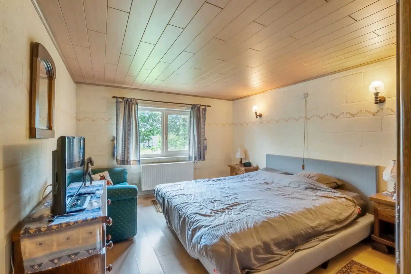 Uniek gelegen woning aan de bosrand op een perceel van 36a67ca waarvan 22a82ca geschikt is als paardenweide! foto 22