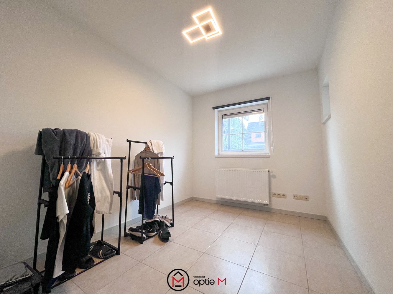 Gelijkvloers appartement met garage en terras in het hart van Munsterbilzen foto 11