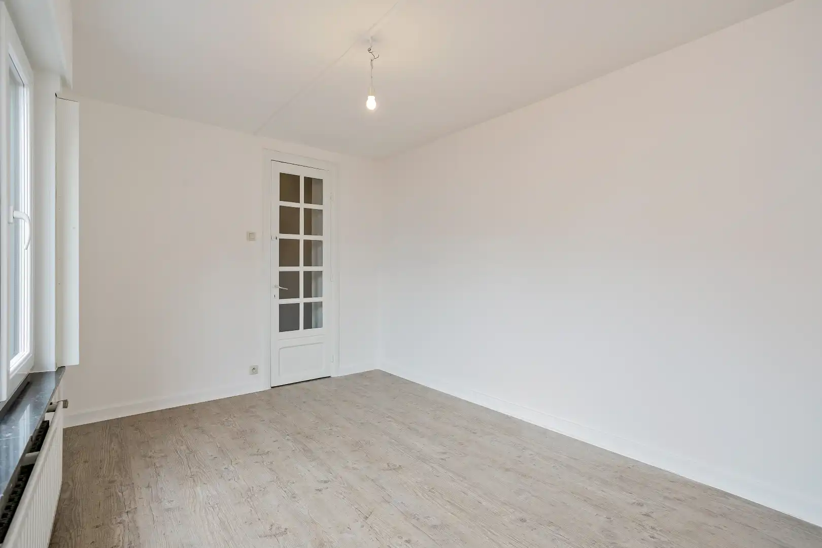 Zeer ruime gerenoveerde woning met 3 à 4 slaapkamers en garage! foto 11