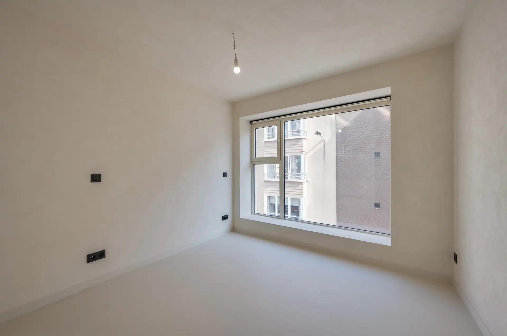 Volledig vernieuwde opbrengsteigendom met drie appartementen en verhuurd handelsgelijkvloers foto 23