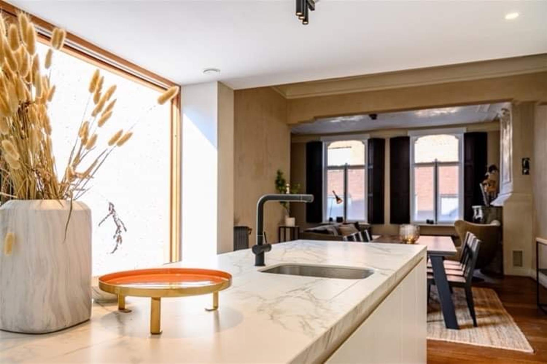 Karaktervol gelijkvloers  appartement met patio en terras foto 11