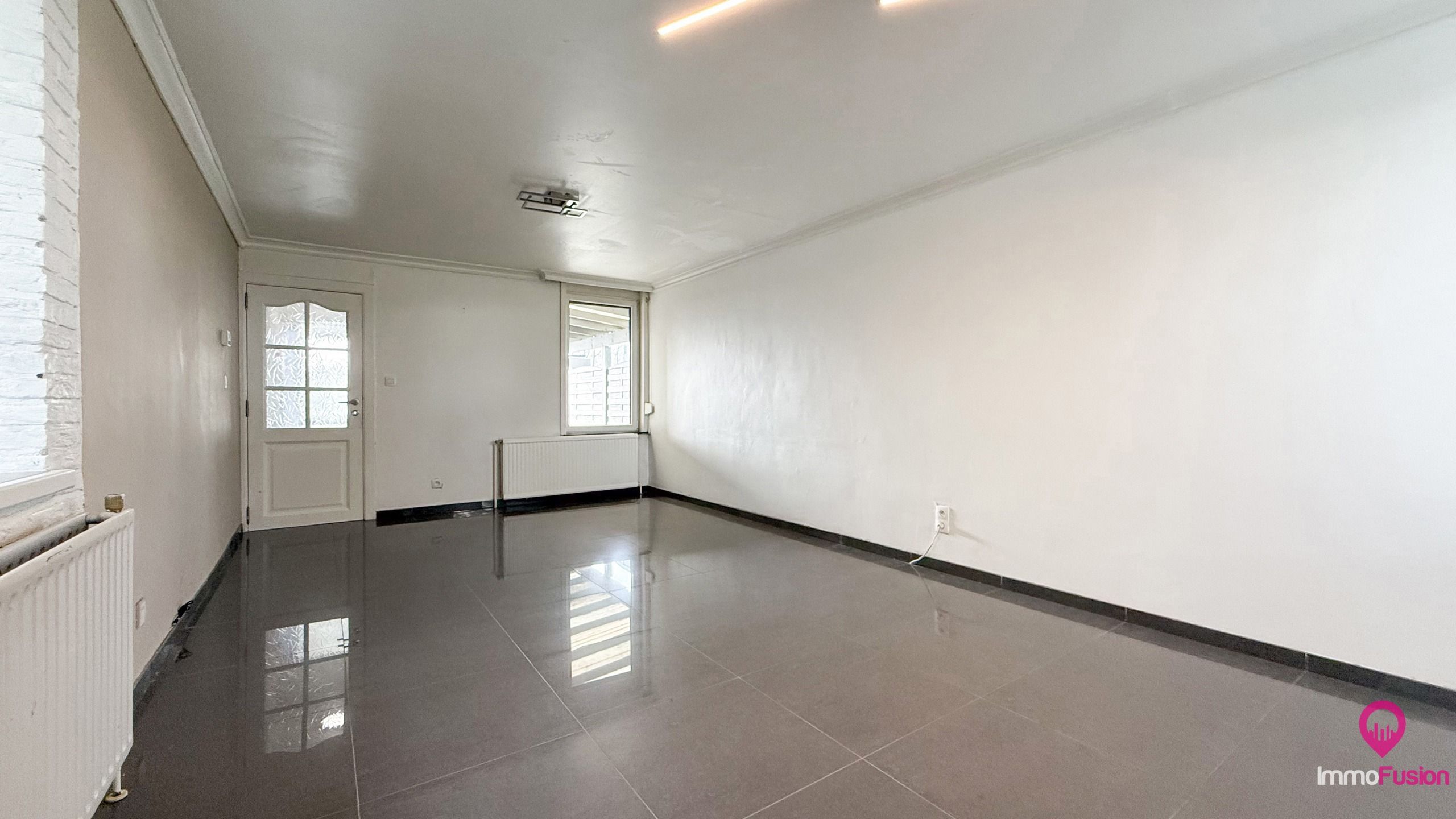 Rustig gelegen HOB met 3 slaapkamers, garage én carport! foto 4