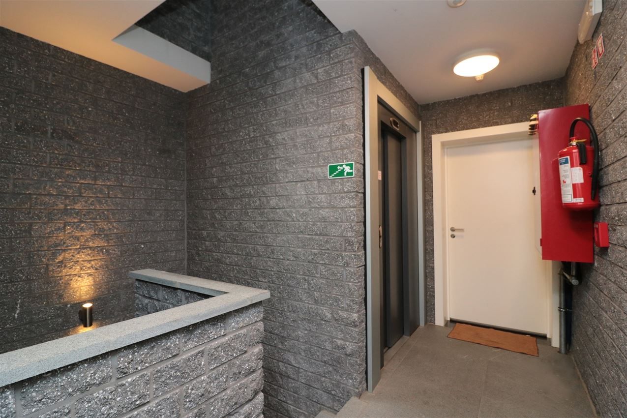 Triplex met groot zuidterras, garage, nabij E314 foto 46