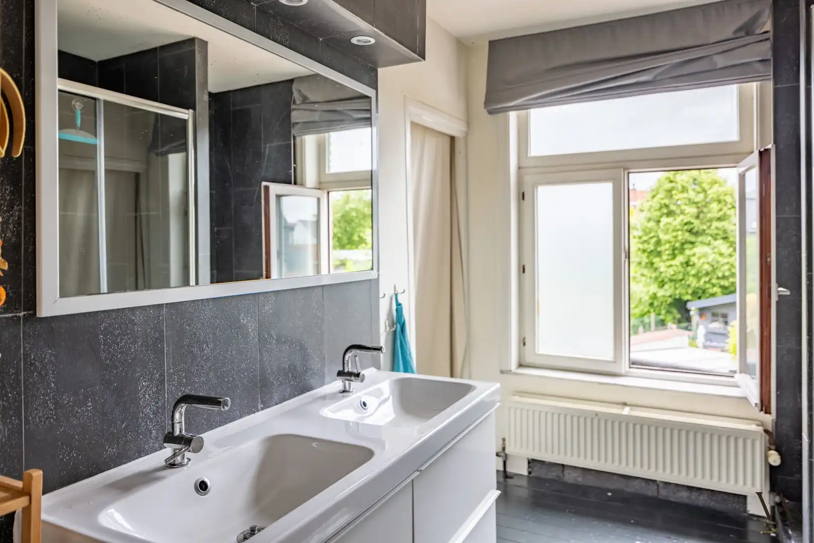 Charmante rijwoning met zonnige tuin in hartje Heverlee foto 12