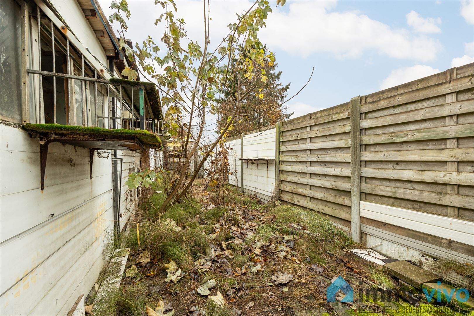 Ruime te renoveren gezinswoning met 4 slpk's en tuin foto 12