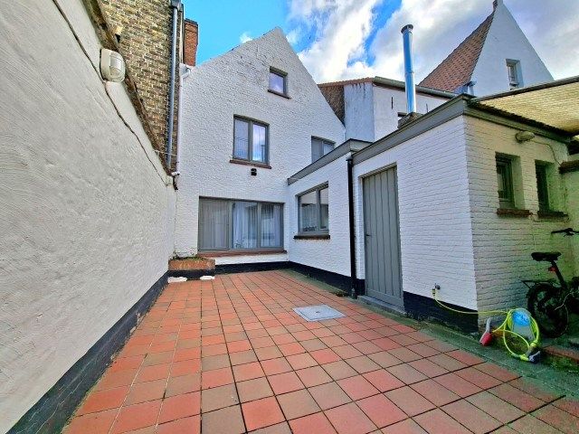 Rijwoning met trapgevel foto 12