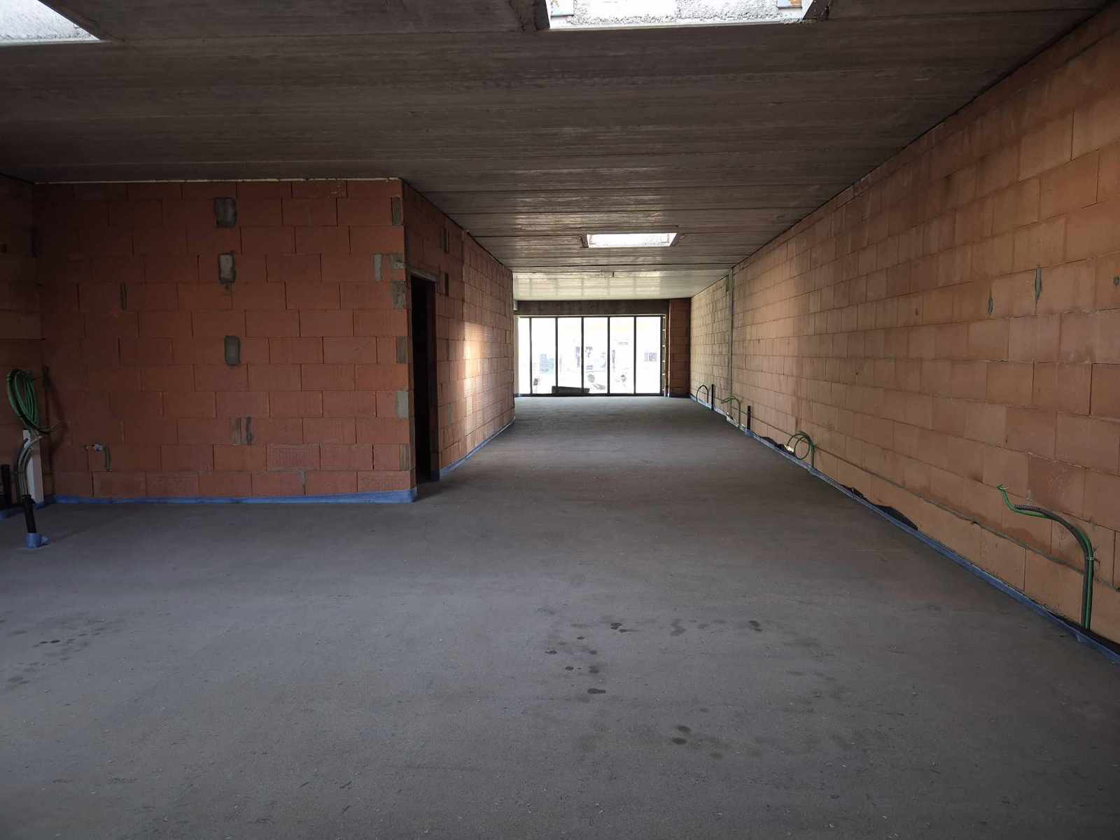 Nieuwbouw handelsgelijkvloers op het Dorp in Serskamp foto 5