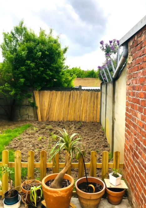 Instapklare rijwoning met charme en mooi rendement in hartje Ronse foto 14