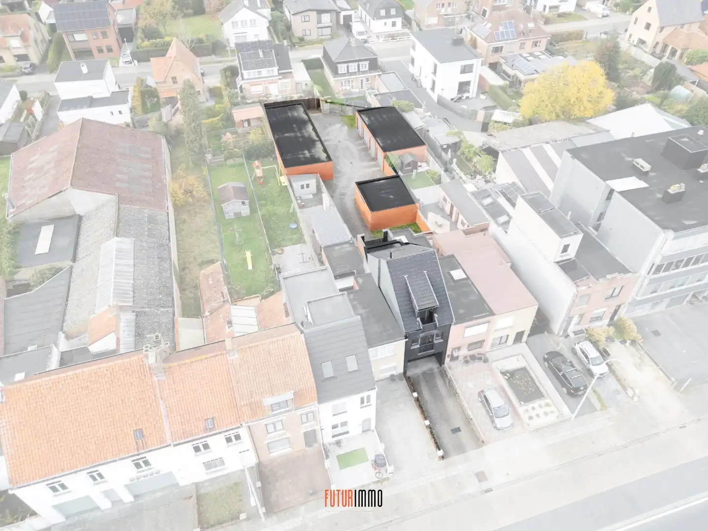 Opbrengsteigendom: duplexappartement + 12 garages foto 2