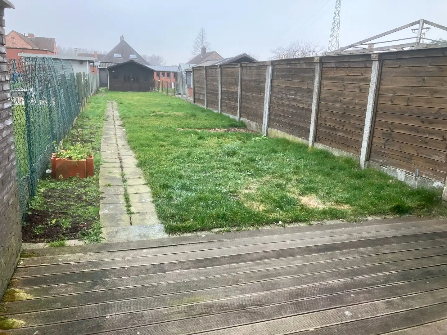 Rijwoning met 2 slaapkamers en achterliggende garage! foto 13