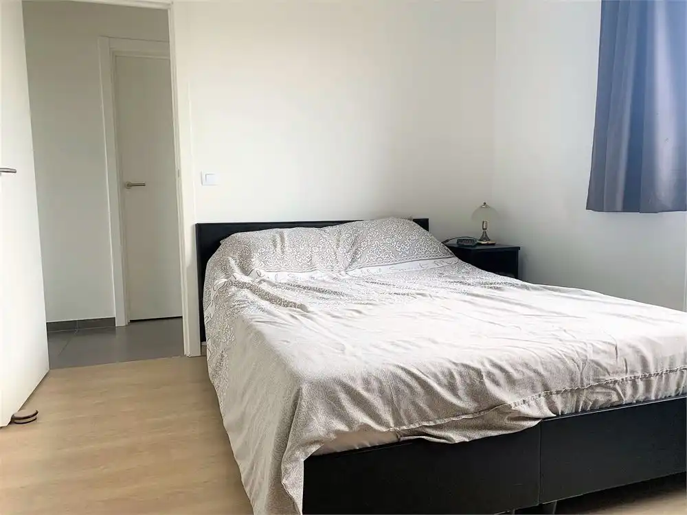 Instapklaar dakappartement met  2 slaapkamers + garage foto 6