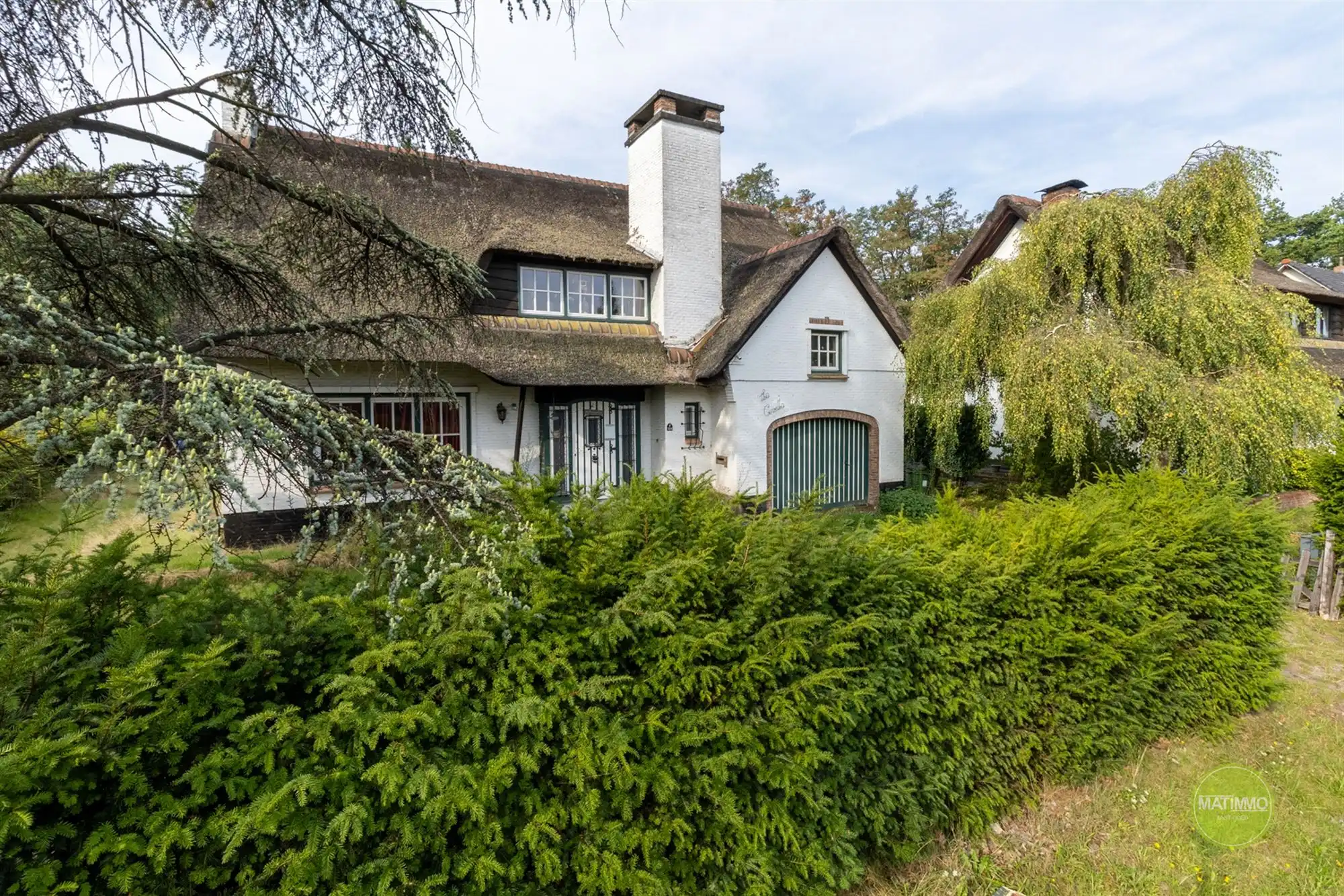 Karaktervolle woning met op royaal perceel in Mol foto {{pictureIndex}}