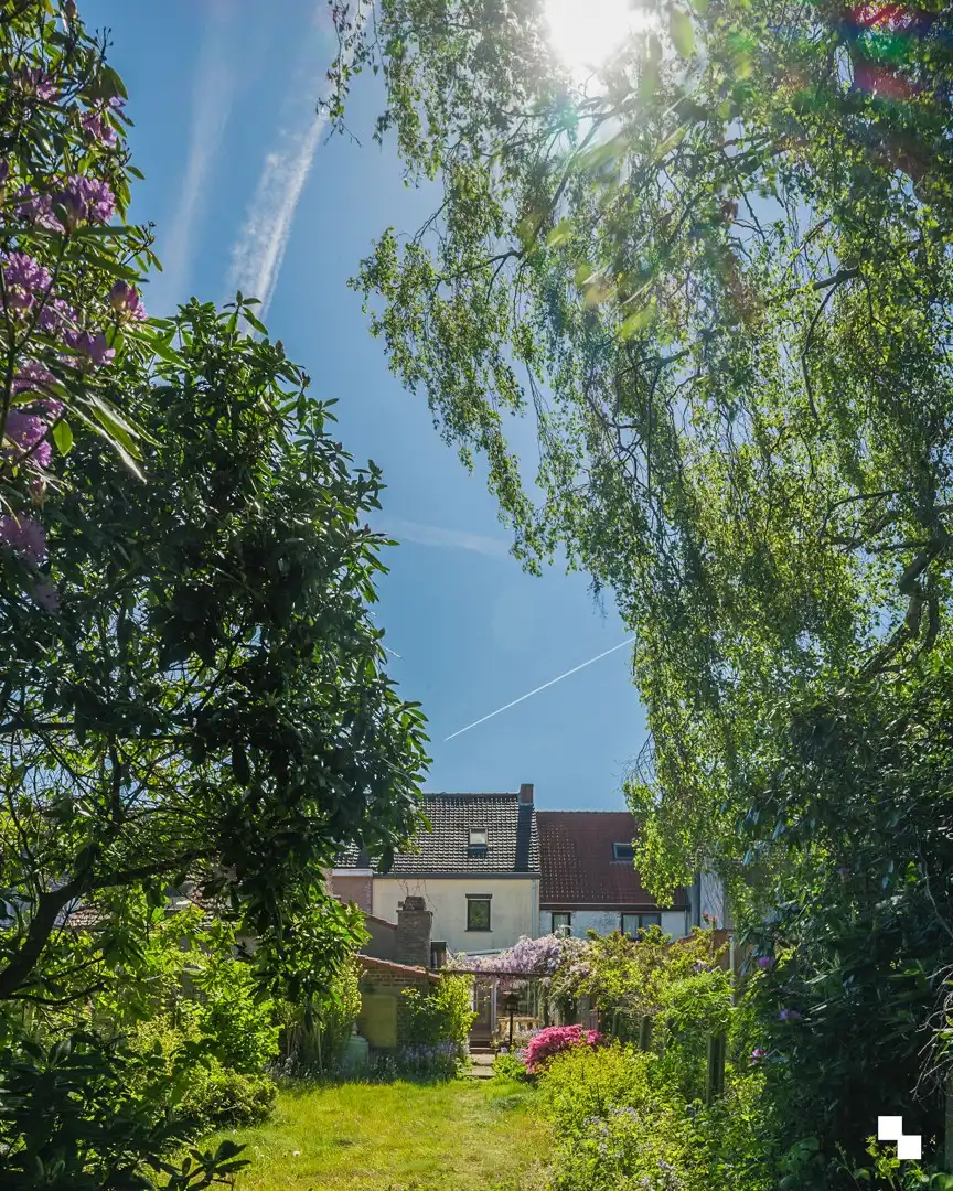 Te renoveren woning met gezellige tuin in het hart van Merelbeke foto 22