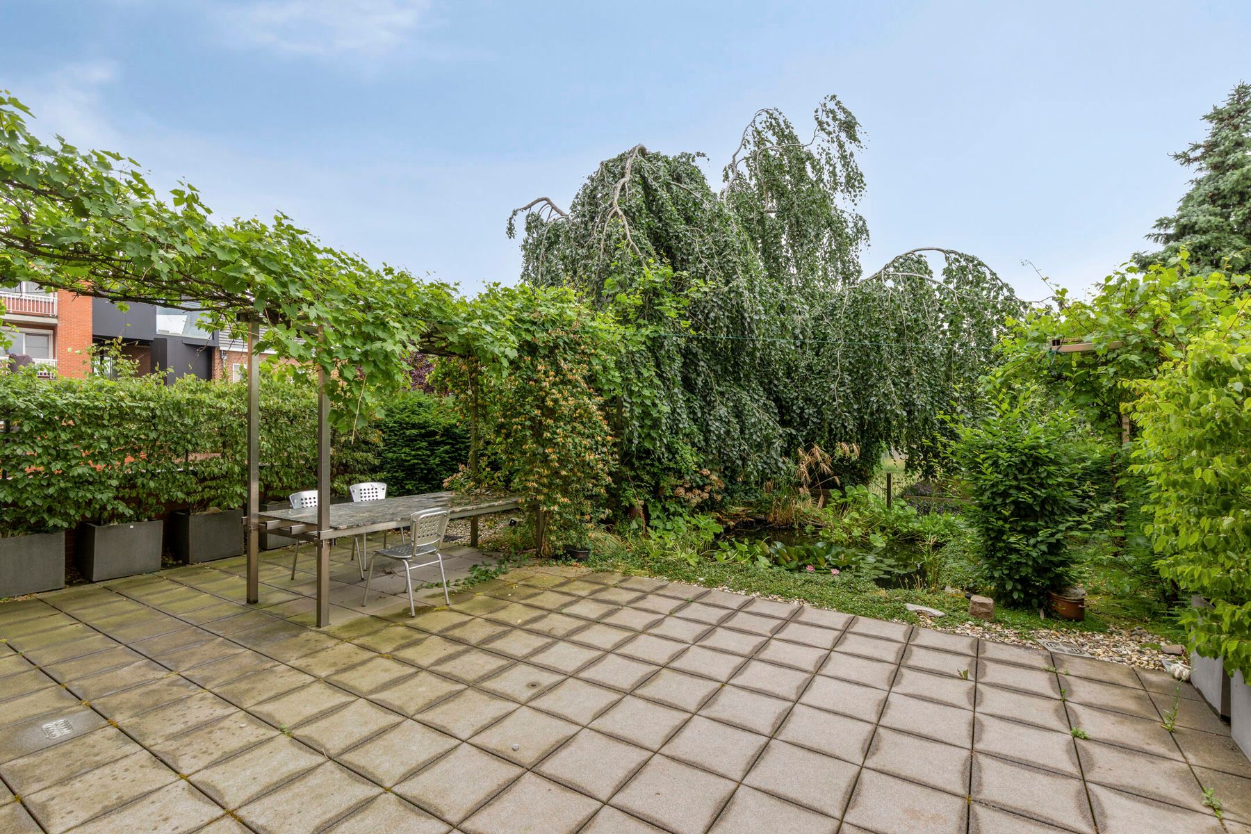 Licht en ruimte in dit appartement met tuin, inpandige garage en lift foto 19