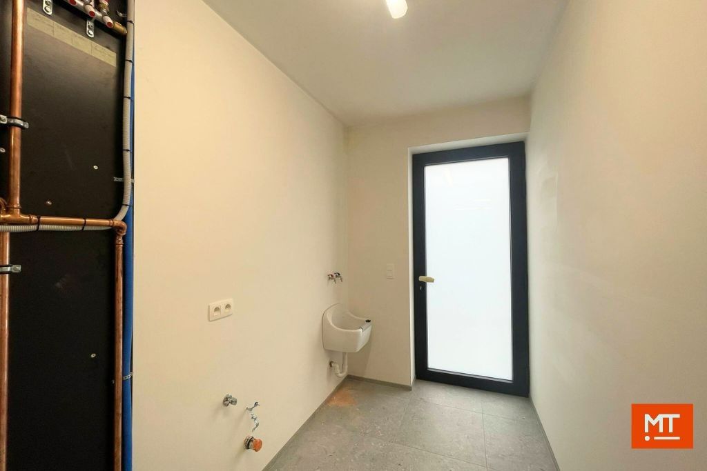 Kwalitatieve nieuwbouwwoning te huur op een rustige locatie in het centrum van Passendale foto 10