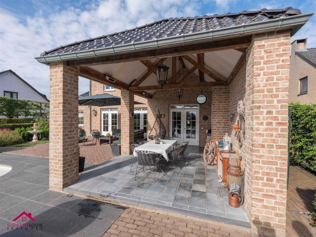 Landelijke villawoning met dubbele vrijstaande garage foto 10