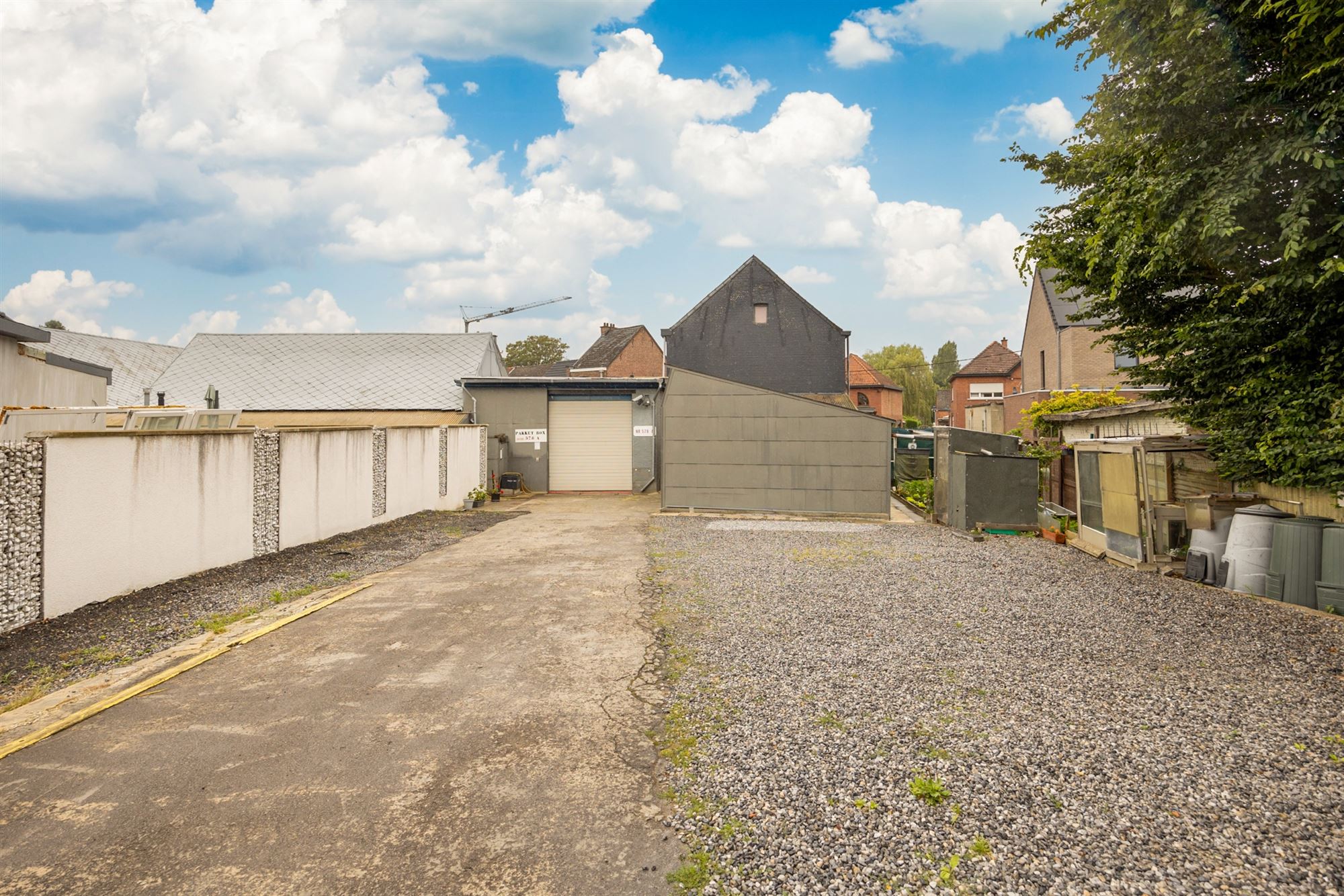 Opbrengsteigendom met magazijnen en woning te Muizen foto 2