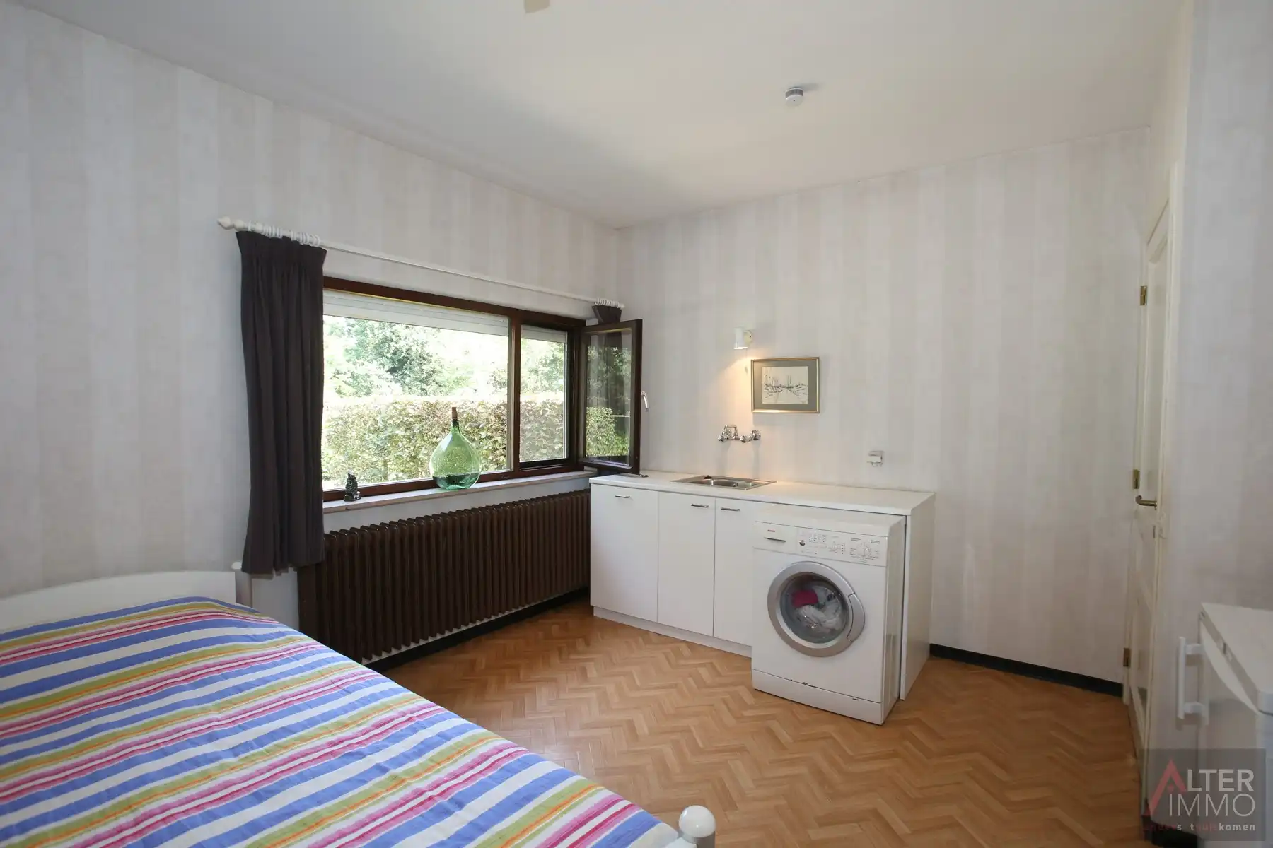 Uitstekend gelegen, gelijkvloerse woning in een tijdloze architectuur met 3 grote slaapkamers op een perceel van 12a 77ca vlakbij Zonhoven centrum. foto 25