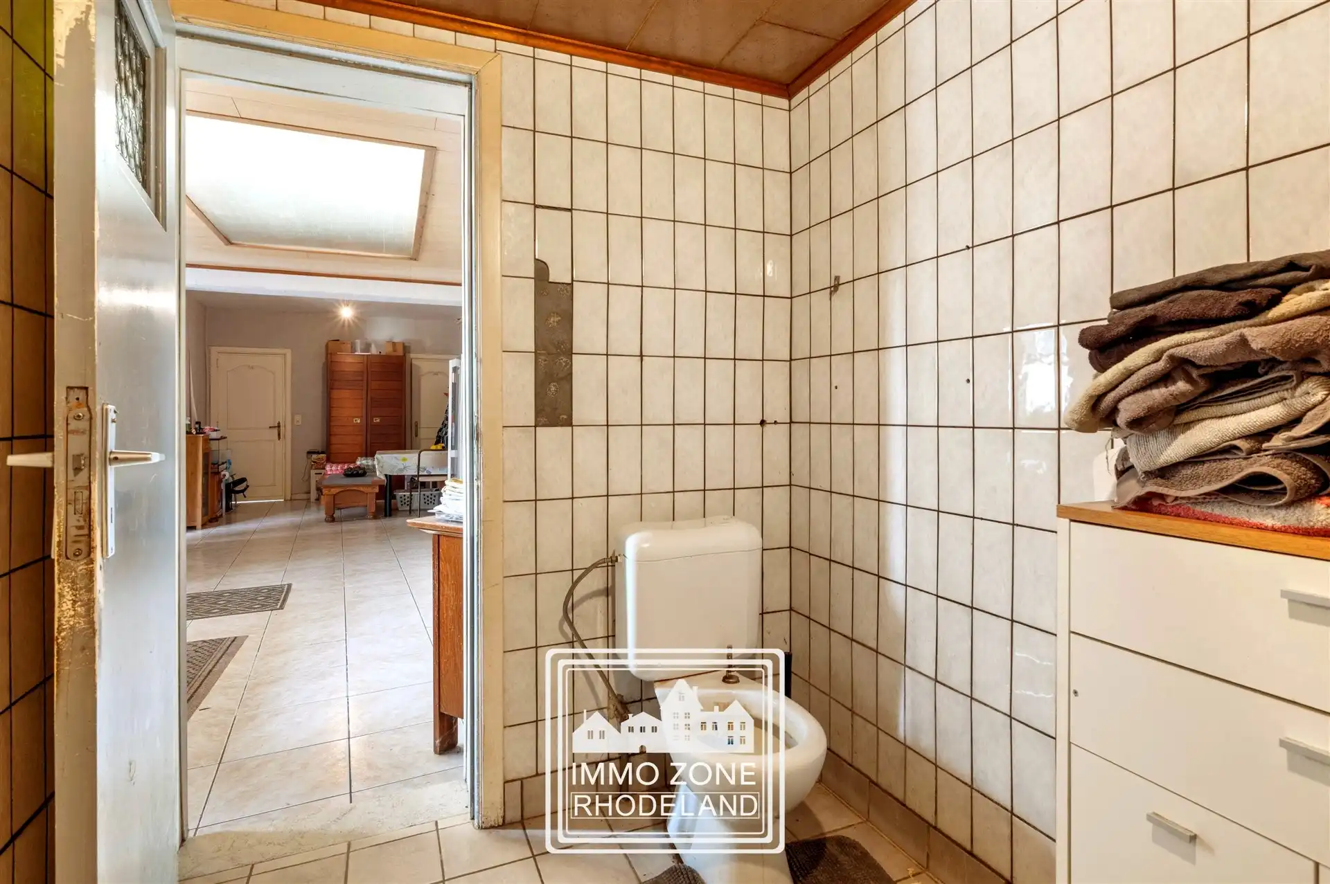 Gunstig gelegen te renoveren woning met veel potentieel foto 14