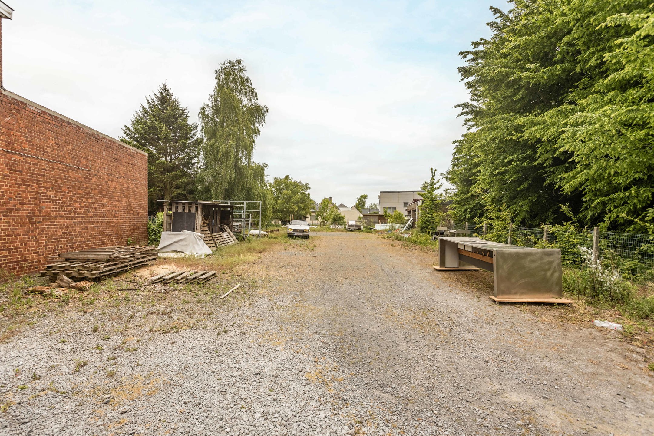 Atelier/loods met bouwgrond en parking in Nederename foto 14