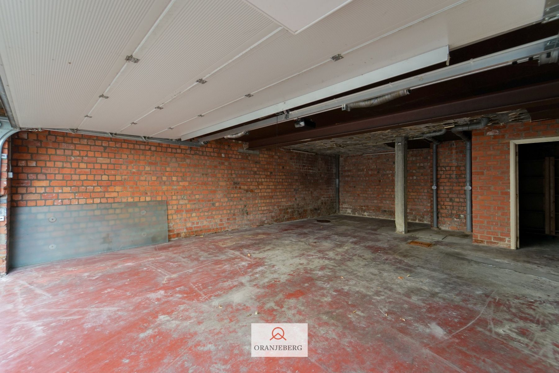 te huur : grote garage voor minimum 2 wagens foto 3