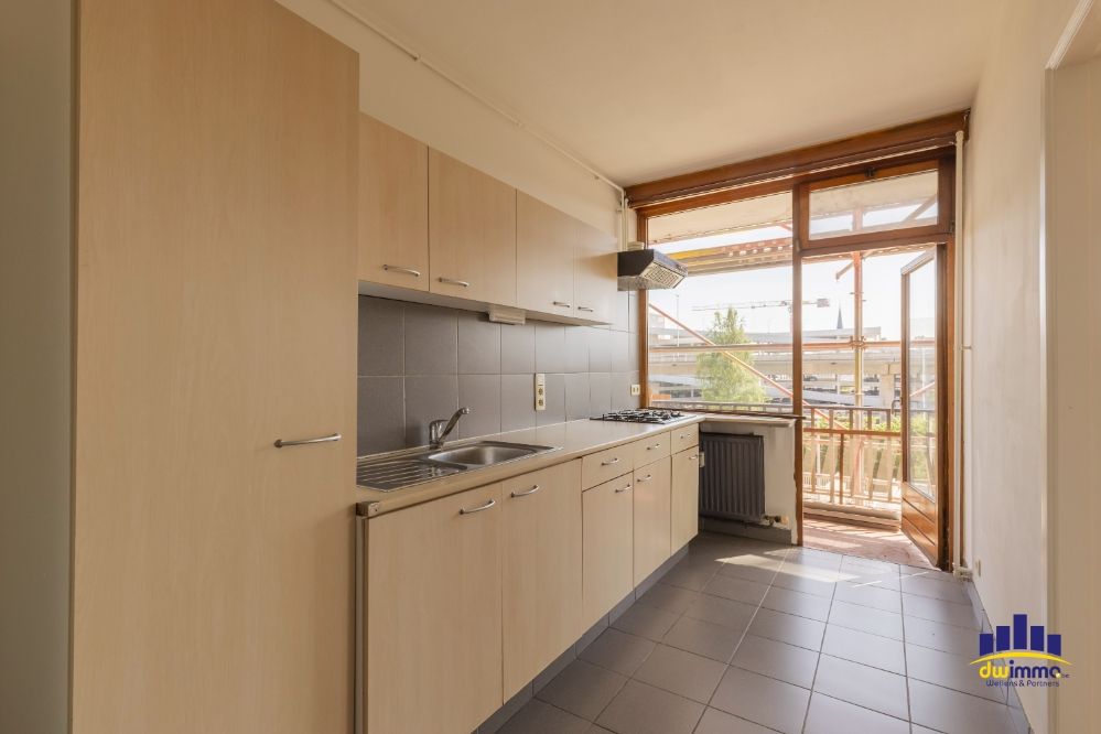 Te koop: Licht en ruim 2-slaapkamerappartement met terras en garage – E3-plein 22, Gent foto 3