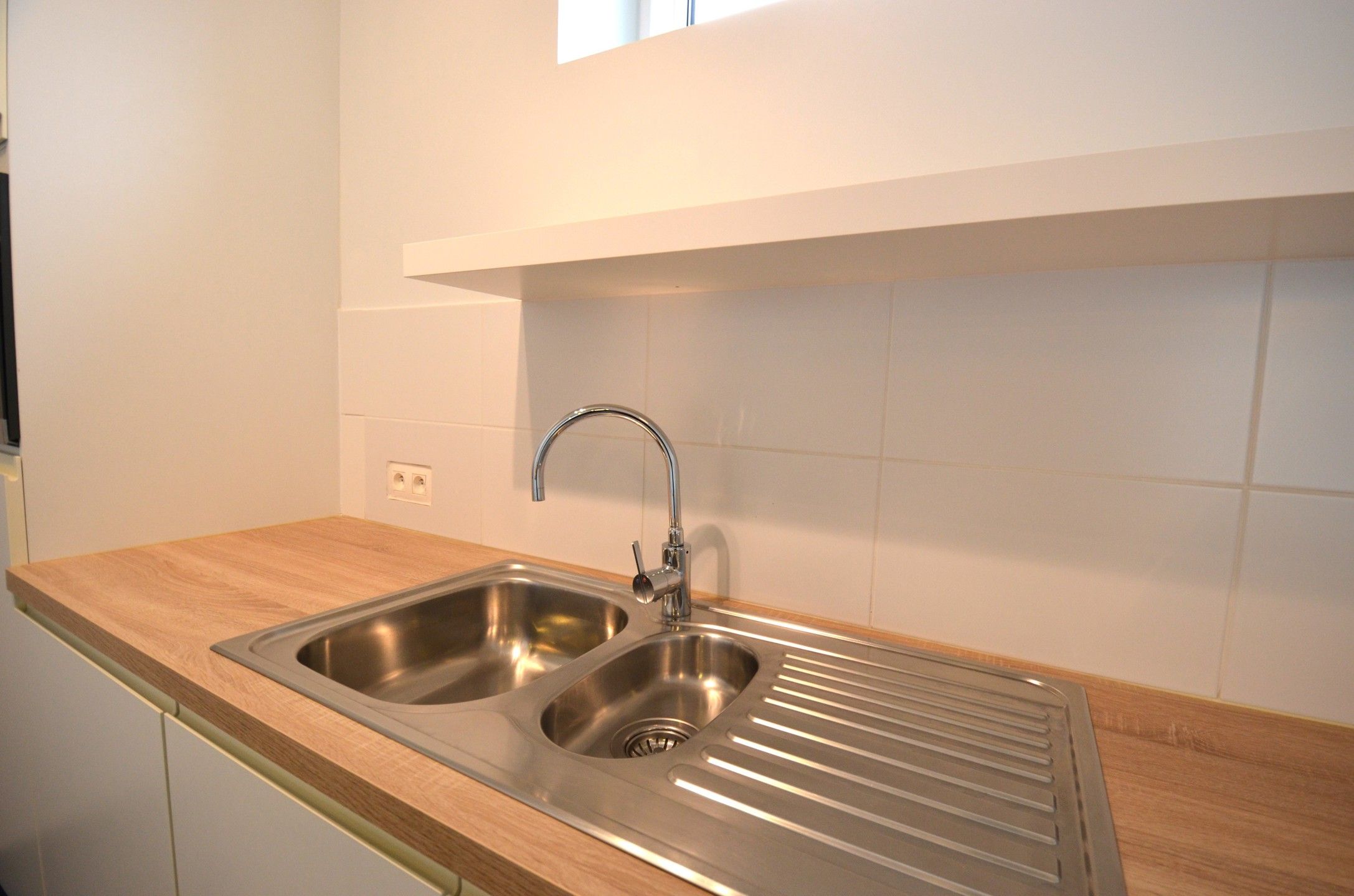 Gezellig 2 slaapkamer-appartementje met autostaanplaats foto 9