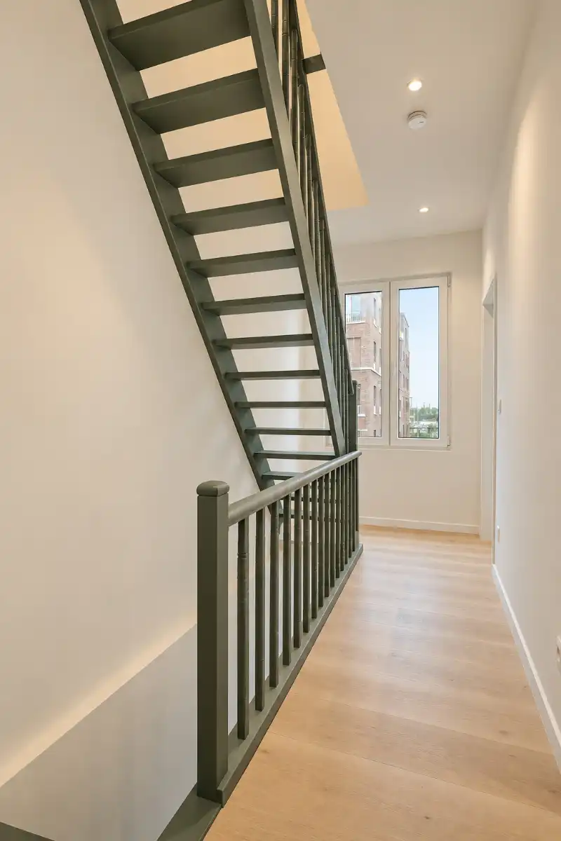 Verscholen achter een charmante groene gevel: prachtig gerenoveerde woning met 3 slaapkamers foto 12