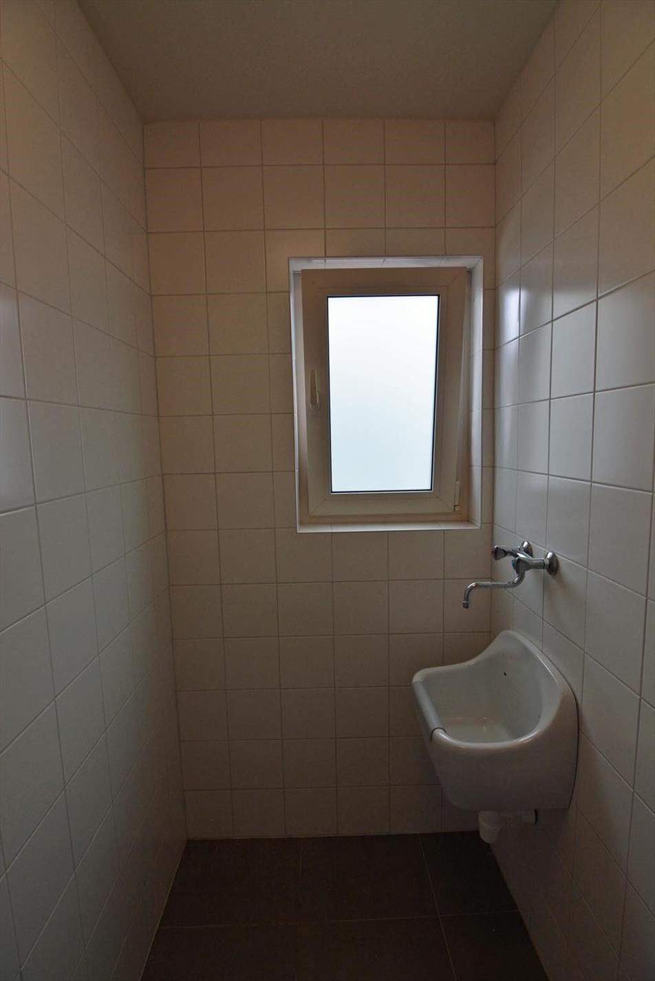 Gelijkvloers appartement met 2 slpk, terras en garage. foto 13