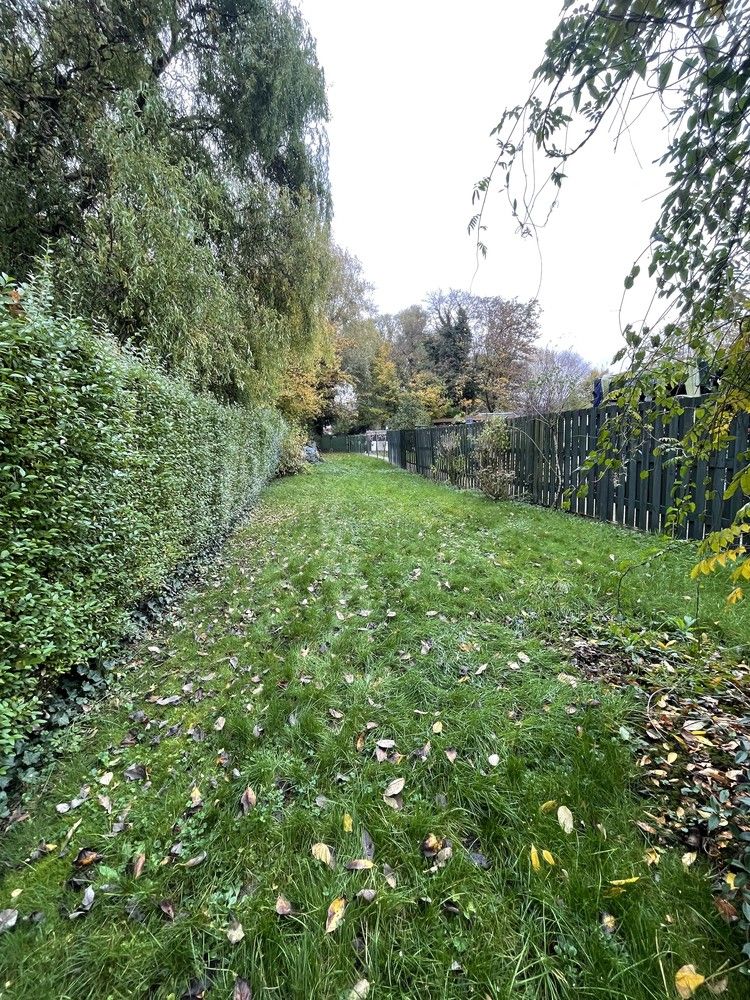 Te renoveren gezinswoning in Runkst-Centrum met stadstuin foto 7