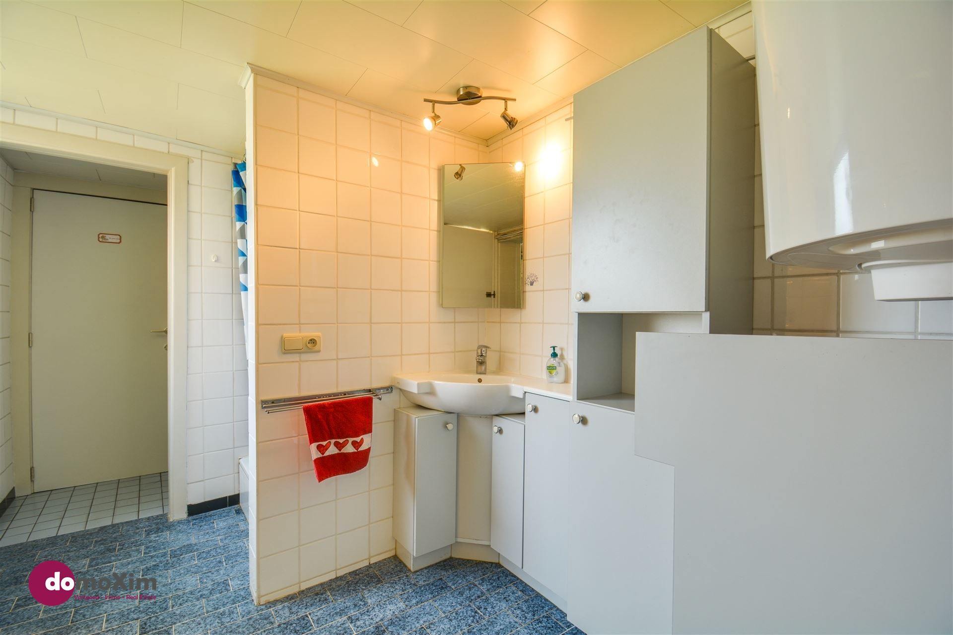 Charmante te renoveren woning met tuin op toplocatie in Boortmeerbeek foto 14