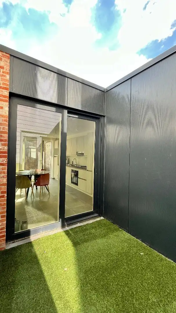 Grote woning met inpandig terras, 3 kamers, tuin,... foto 7