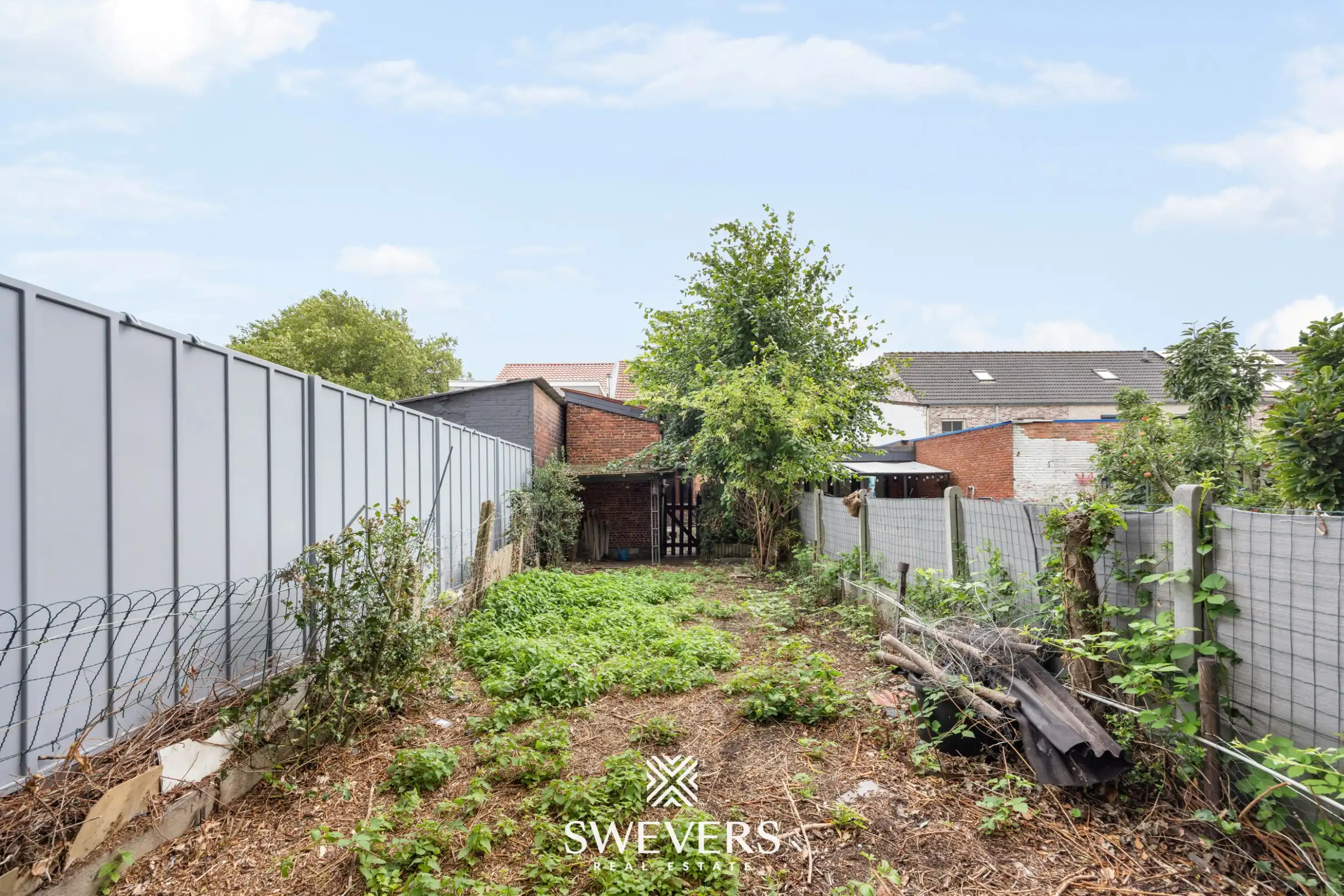 Renovatieproject met veel potentieel: karaktervolle rijwoning met tuin in de Banneuxwijk foto 20