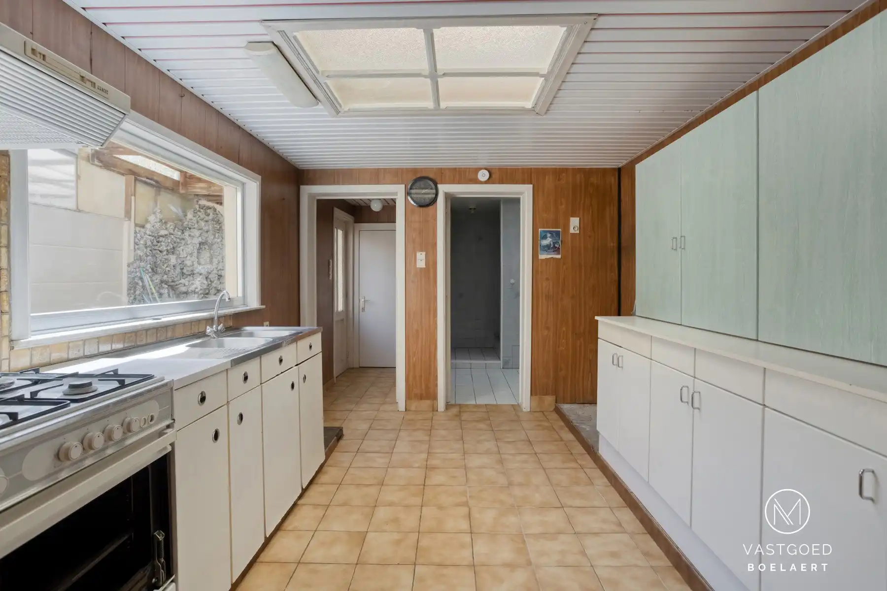 Te renoveren halfopen woning met zonnige tuin in rustige straat nabij Aalst foto 7