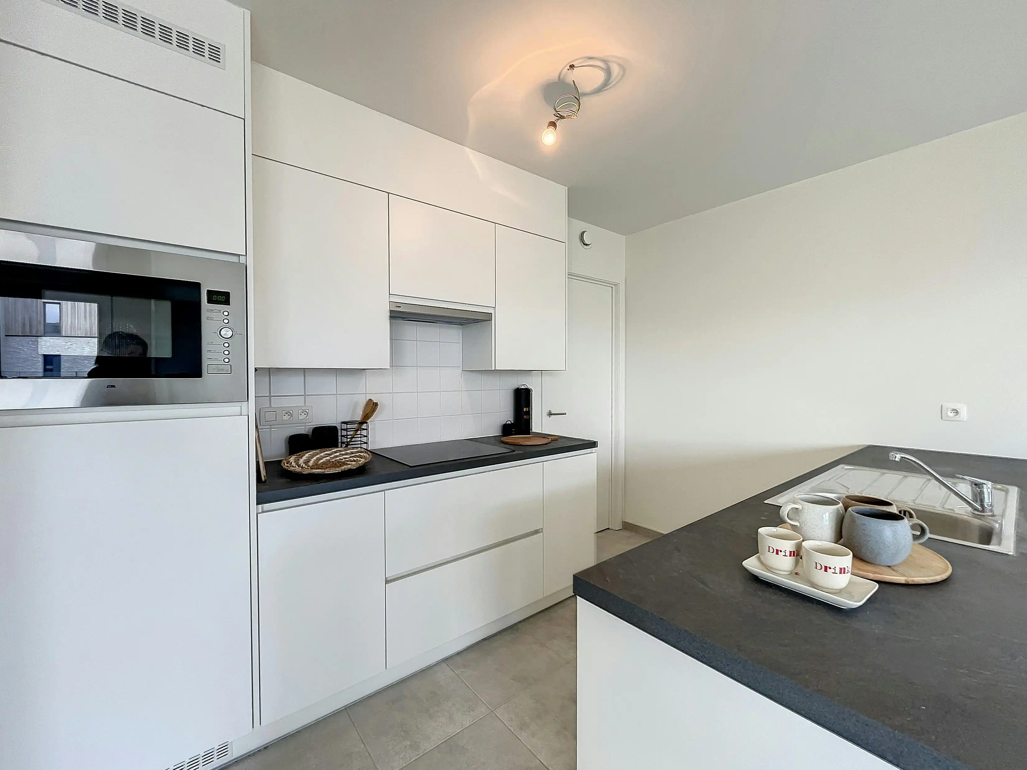 Opbrengsteigendom: 3 verhuurde entiteiten (EPC A) met garage foto 7