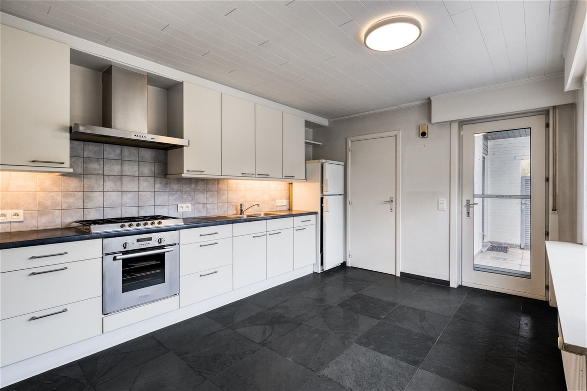 Moderne, zéér praktische woning met leuke tuin! 3 Slpks. foto 6