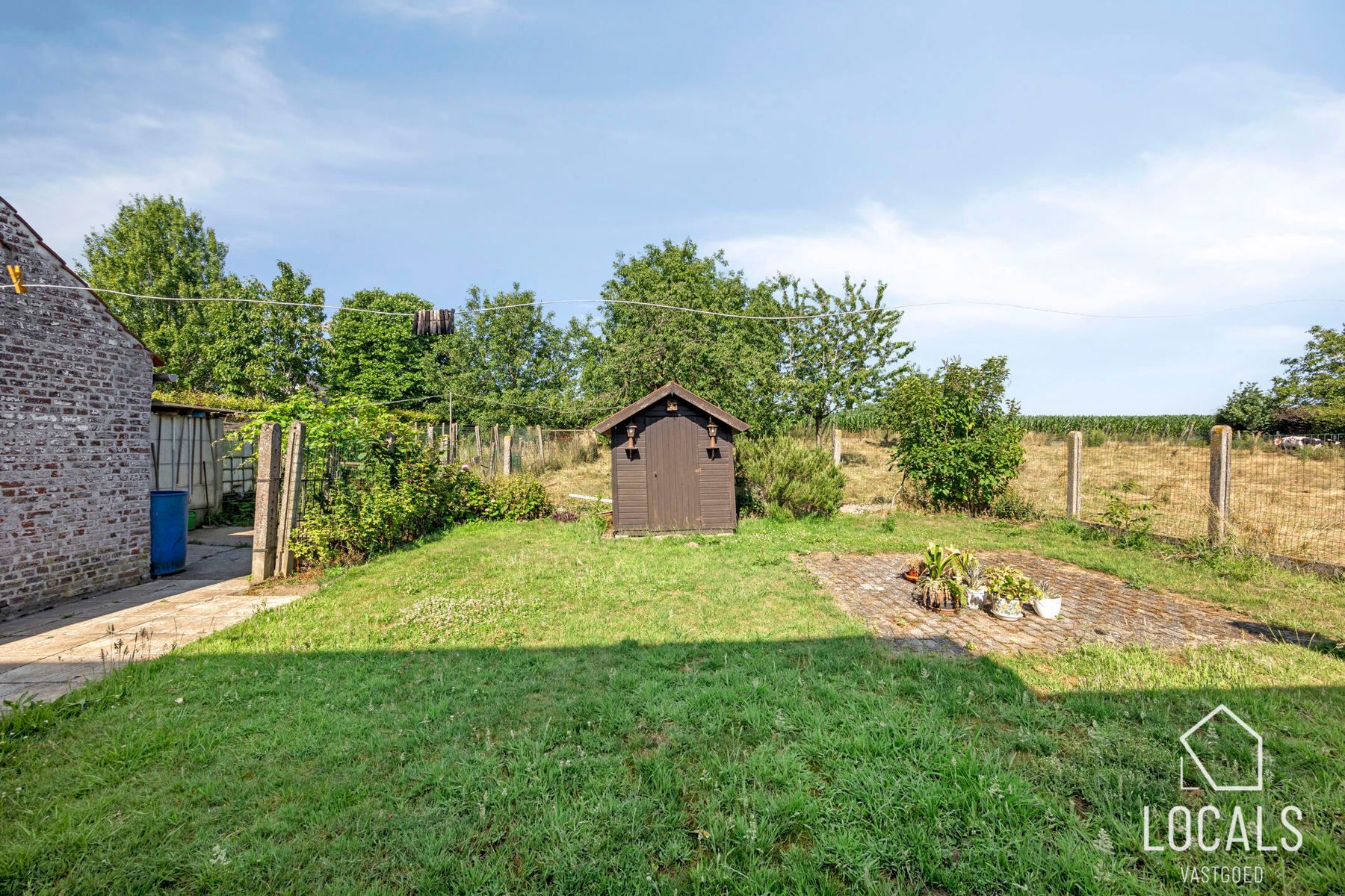 Open bebouwing met 3 slpks, garage, opslagruimte & tuin foto 27