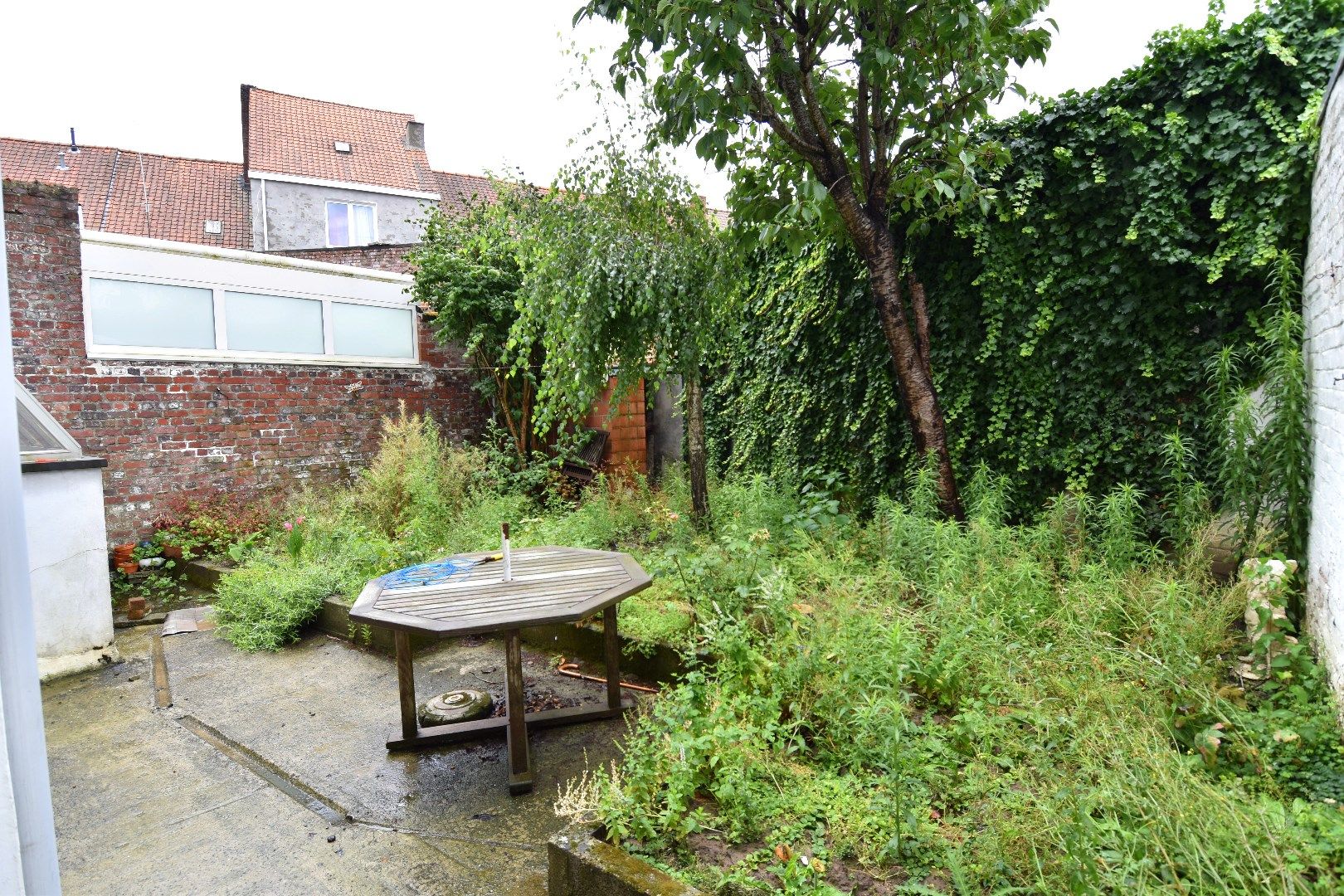 Ruime 3-slaapkamerwoning met bovenliggend appartement (woning) te koop in centrum-Kortrijk foto 13